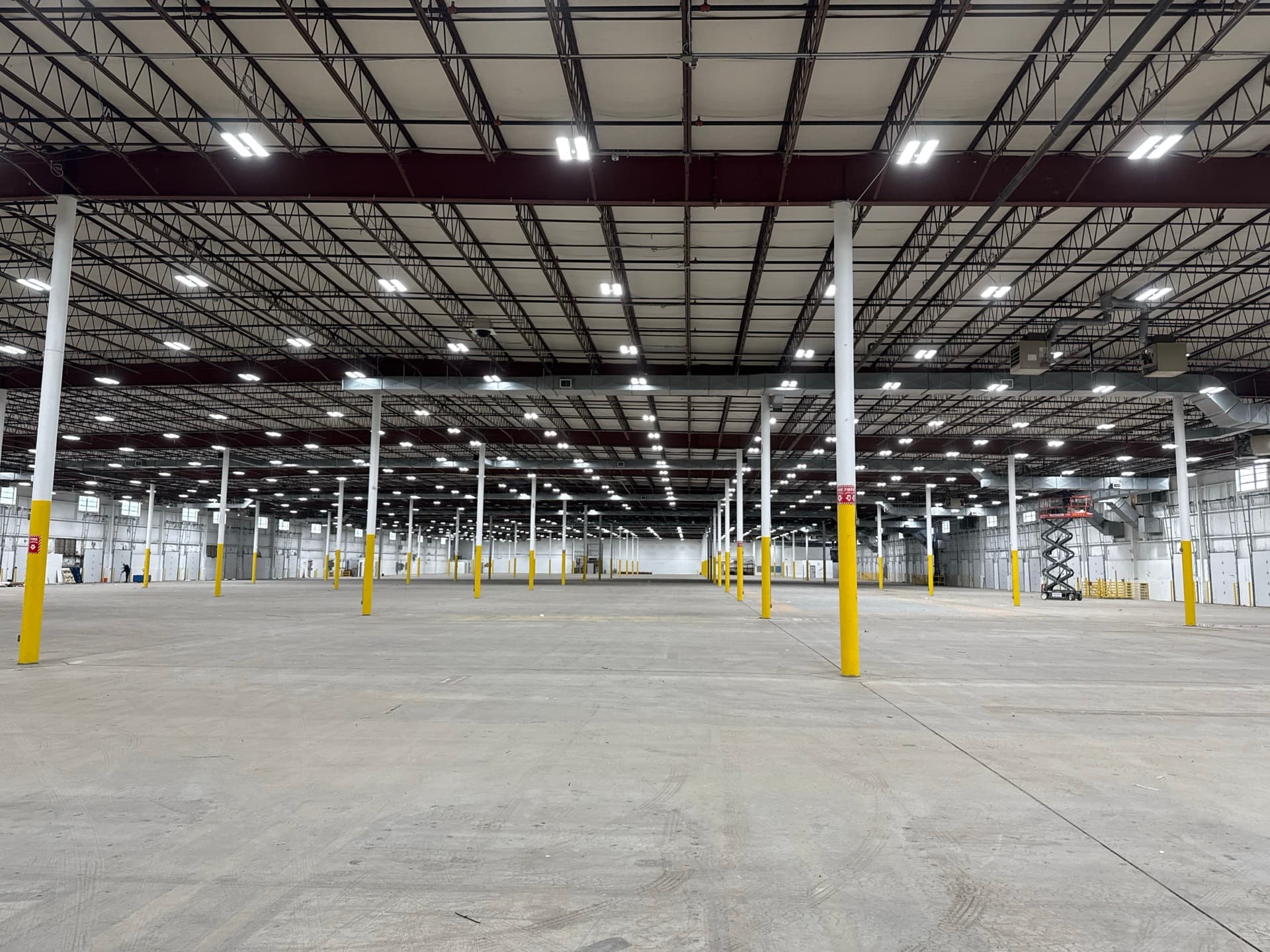 Warehouse interior after a commercial LED lighting upgrade by VK Light Solutions in New Jersey